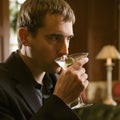 Man drinking martini. Royalty Free Stock Photo