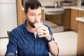 Man drinking milk from a glass Royalty Free Stock Photo