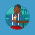 Man drinking orange cocktail at the bar. Royalty Free Stock Photo