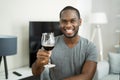 Man Drinking Red Wine In Video Conference Royalty Free Stock Photo