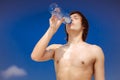 A man is drinking water from the bottle Royalty Free Stock Photo