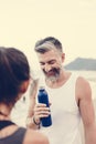 Man drinking water to rehydrate