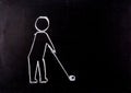 Man drive golf painting on blackboard