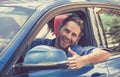 Man driver happy smiling showing thumbs up driving sport car Royalty Free Stock Photo