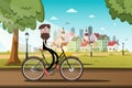 Man drives a bike with city park on background