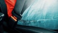 Man drives a car with his seat belt fastened, close-up shot Royalty Free Stock Photo