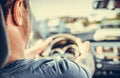 A man drives a car. Royalty Free Stock Photo