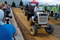 A Man Drives at a Lawn Tractor Pull