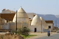 A man drives motorbike on a road in a small town near Seiyun, Yemen.