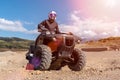 A man is driving ATV on off-road. Royalty Free Stock Photo