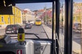 Man driving an autobus during the day in Lisbon