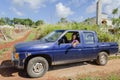 Man Driving Blue Pickup Truck Royalty Free Stock Photo