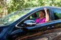 Man Driving A Car In Forest.