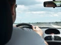 Man driving a car on a highway Royalty Free Stock Photo