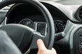 Man driving a car with his hands on the steering wheel Royalty Free Stock Photo