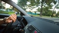 Man driving a car moving fast on a highway Royalty Free Stock Photo