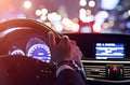 Man driving a car at night Royalty Free Stock Photo