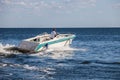 Man driving a fast boat Royalty Free Stock Photo