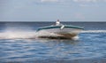 Man driving a fast boat Royalty Free Stock Photo