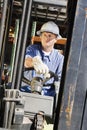 Man Driving A Forklift Royalty Free Stock Photo
