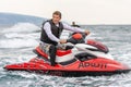 Man driving jet ski watercraft in open Black Sea