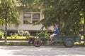 Man driving a motorized cultivator, also called motokultivator, with a speed blur, in Ablibunar, a rural and agricultural village