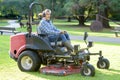 Man driving professional mower Royalty Free Stock Photo