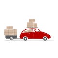 Man driving red car with boxes on the roof rack Royalty Free Stock Photo