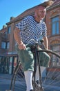 Man driving on a Retro pre war Bike