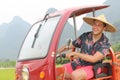 Man driving a tuk-tuk in Asia Royalty Free Stock Photo