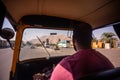 Man driving TukTuk Vehicle near Luxor Temple in Egypt Royalty Free Stock Photo