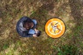 Man with a drone on the ground preparing it to fly Royalty Free Stock Photo