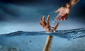 Hand of person drowning in water Royalty Free Stock Photo