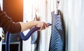 Man drying car carpet with vacuum cleaner after washing Royalty Free Stock Photo