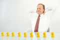 Man with ducks in row Royalty Free Stock Photo