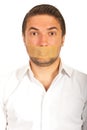 Man with duct tape over mouth Royalty Free Stock Photo