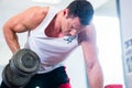 Man with dumbbells at sport in fitness gym Royalty Free Stock Photo