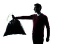 Man dumping garbage bag Royalty Free Stock Photo