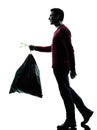 Man dumping garbage bag Royalty Free Stock Photo