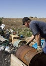 Man dumping trash Royalty Free Stock Photo