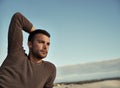 Man, dune and sand for thinking, contemplating and planning with vision and ideas. Tourist, cape town beach and ocean Royalty Free Stock Photo