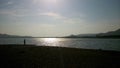 Man dwarfed by giant lake