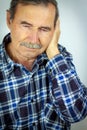 Man with ear pain Royalty Free Stock Photo