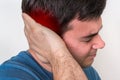 Man with earache is holding his aching ear Royalty Free Stock Photo