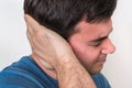 Man with earache is holding his aching ear Royalty Free Stock Photo