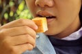 Man eating bake bread, butter Royalty Free Stock Photo