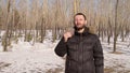 Man eating chocolate in the forest