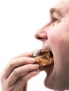 Man eating donut Royalty Free Stock Photo