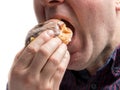 Man eating donut