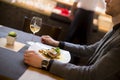 Man eating grilled salmon at restaurant Royalty Free Stock Photo